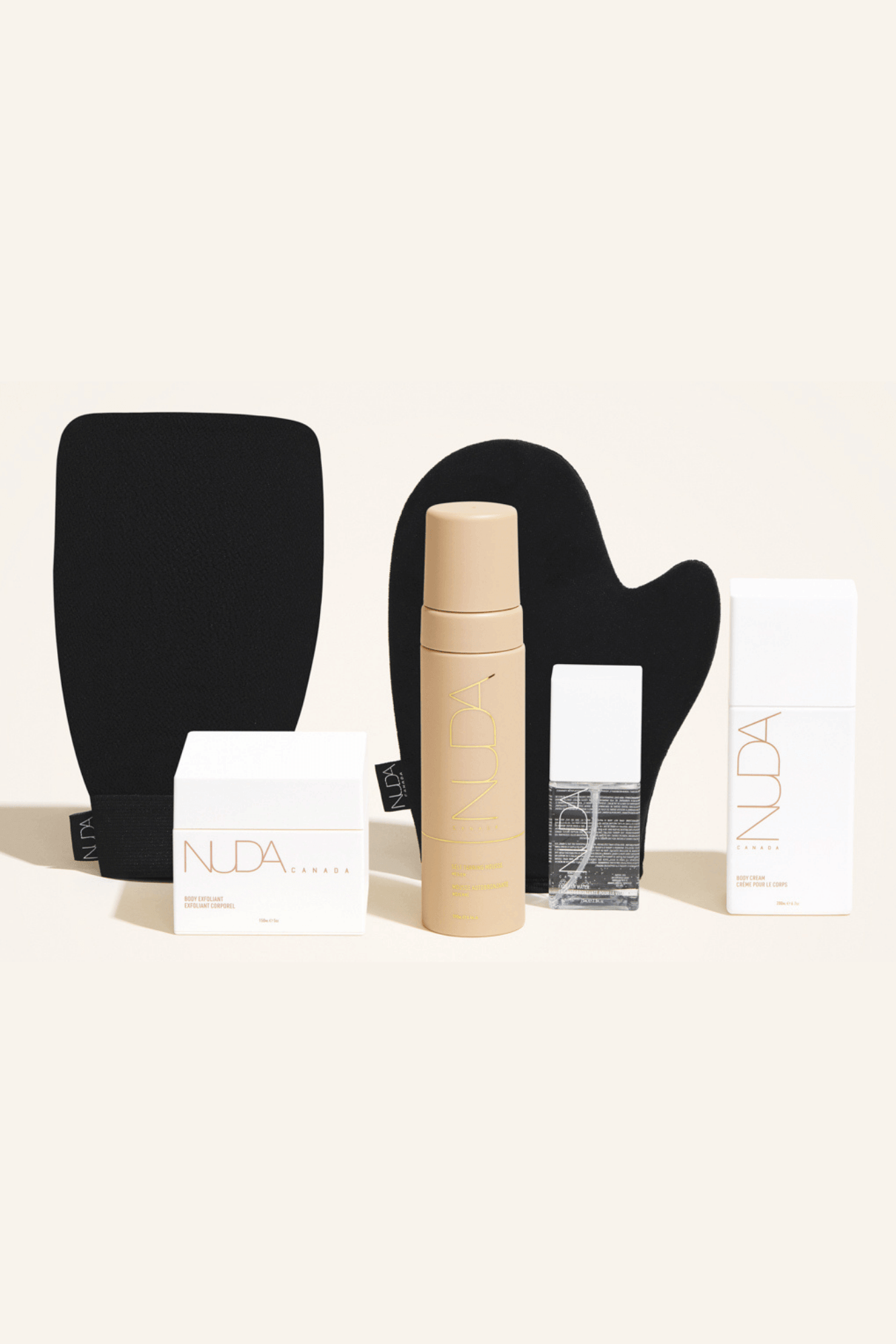 Deluxe Routine Kit including self tanning mousse, exfoliating mitt, and body cream for a sun-kissed glow year-round.