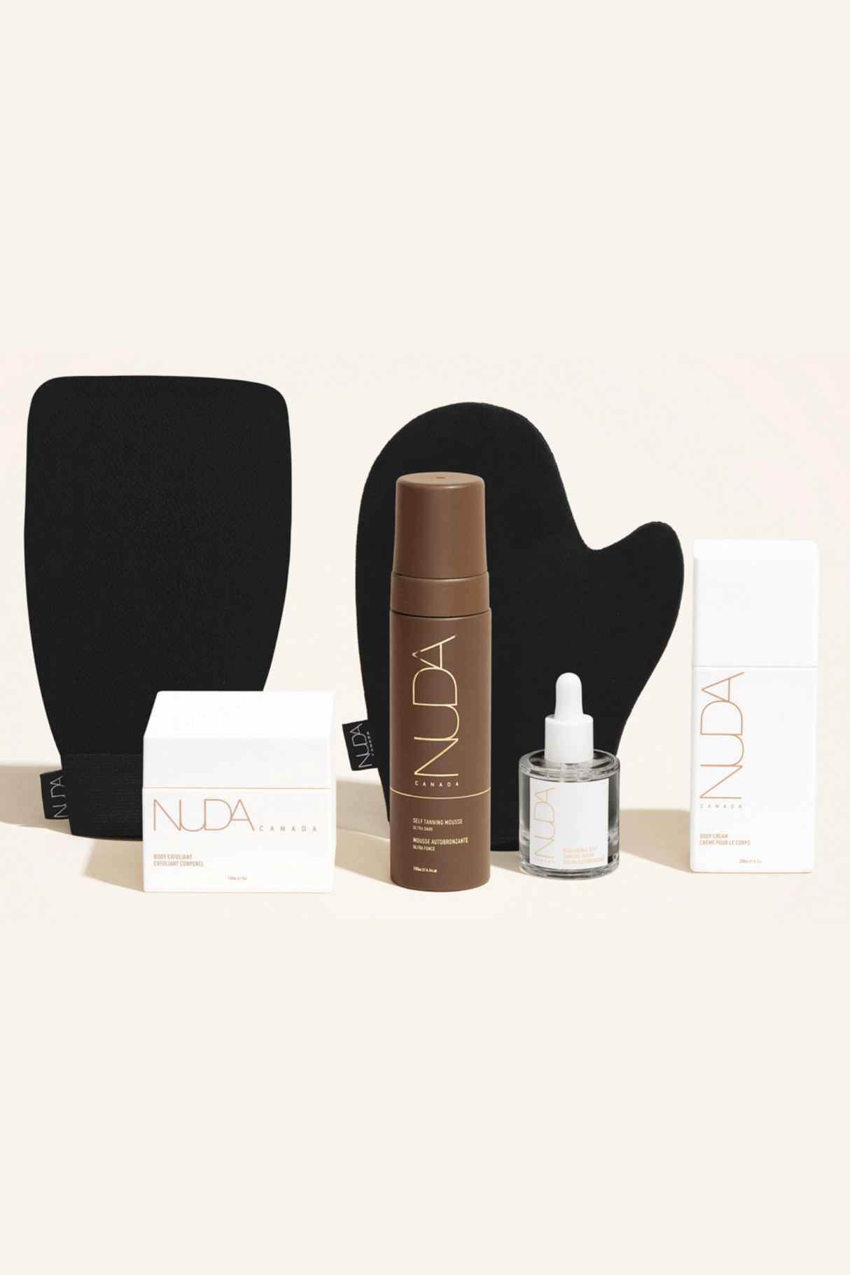 Deluxe Routine Kit with self tanning mousse, body exfoliant, exfoliating mitt, face tanner, and body cream for a sun-kissed glow.