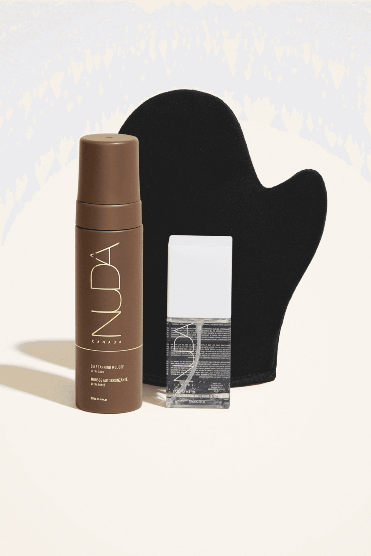 Glow Kit with self tanning mousse, facial tanner, and mitt for a radiant, sun-kissed complexion suitable for all skin tones.