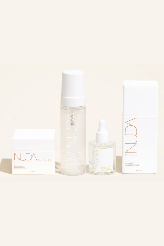 Nuda Routine Kit showcasing self tanning mousse, body exfoliant, face tanner, and body cream for a customized year-round tan.