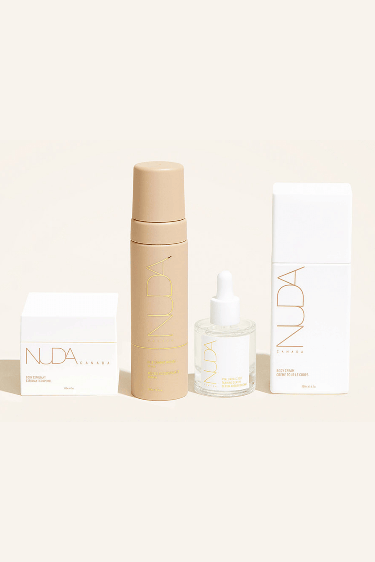 Nuda Routine Kit with body exfoliant, self tanning mousse, face tanner, and body cream for a year-round beautiful tan.