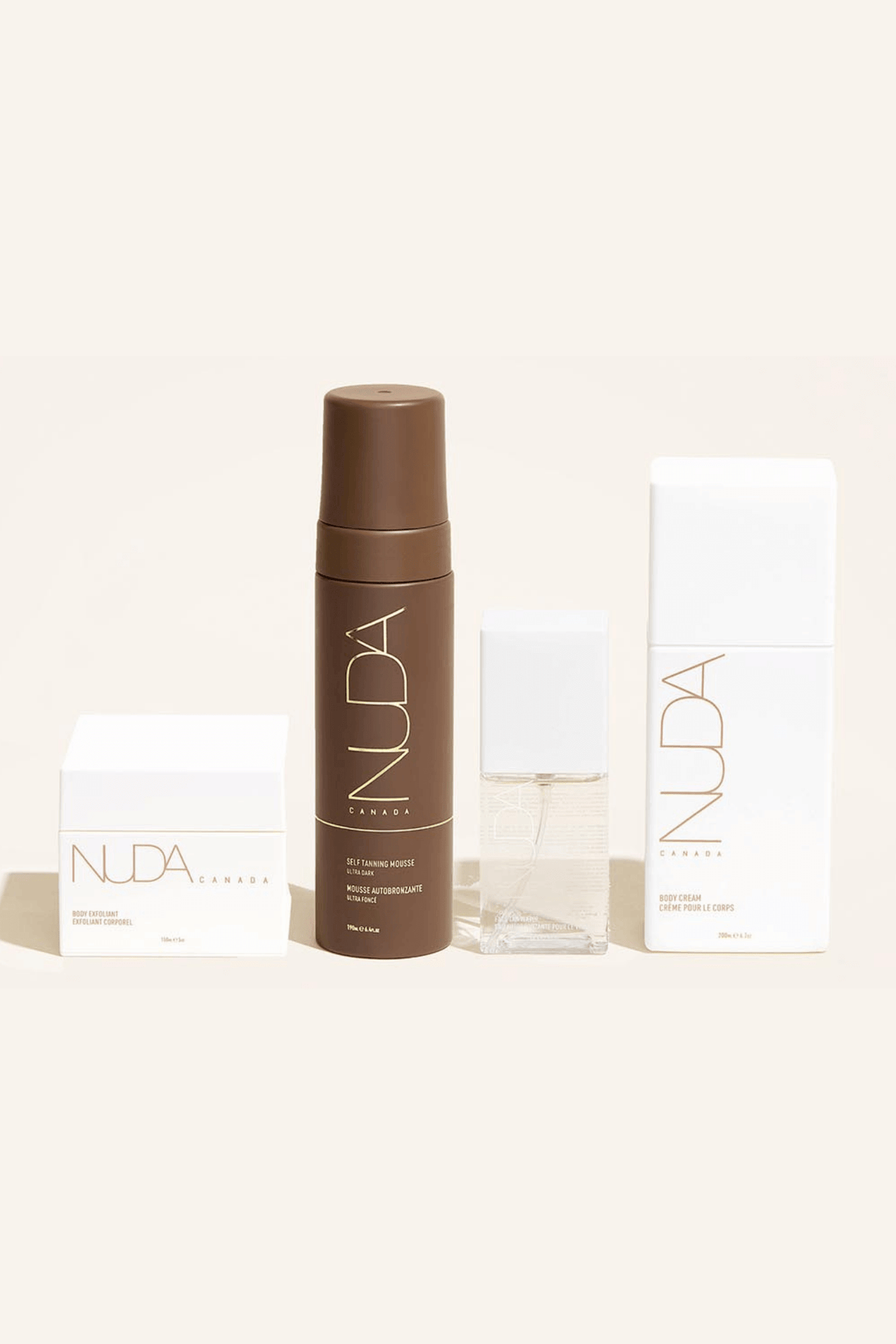 Nuda Routine Kit with body exfoliant, self tanning mousse, face tanner, and body cream for a customizable year-round glow.
