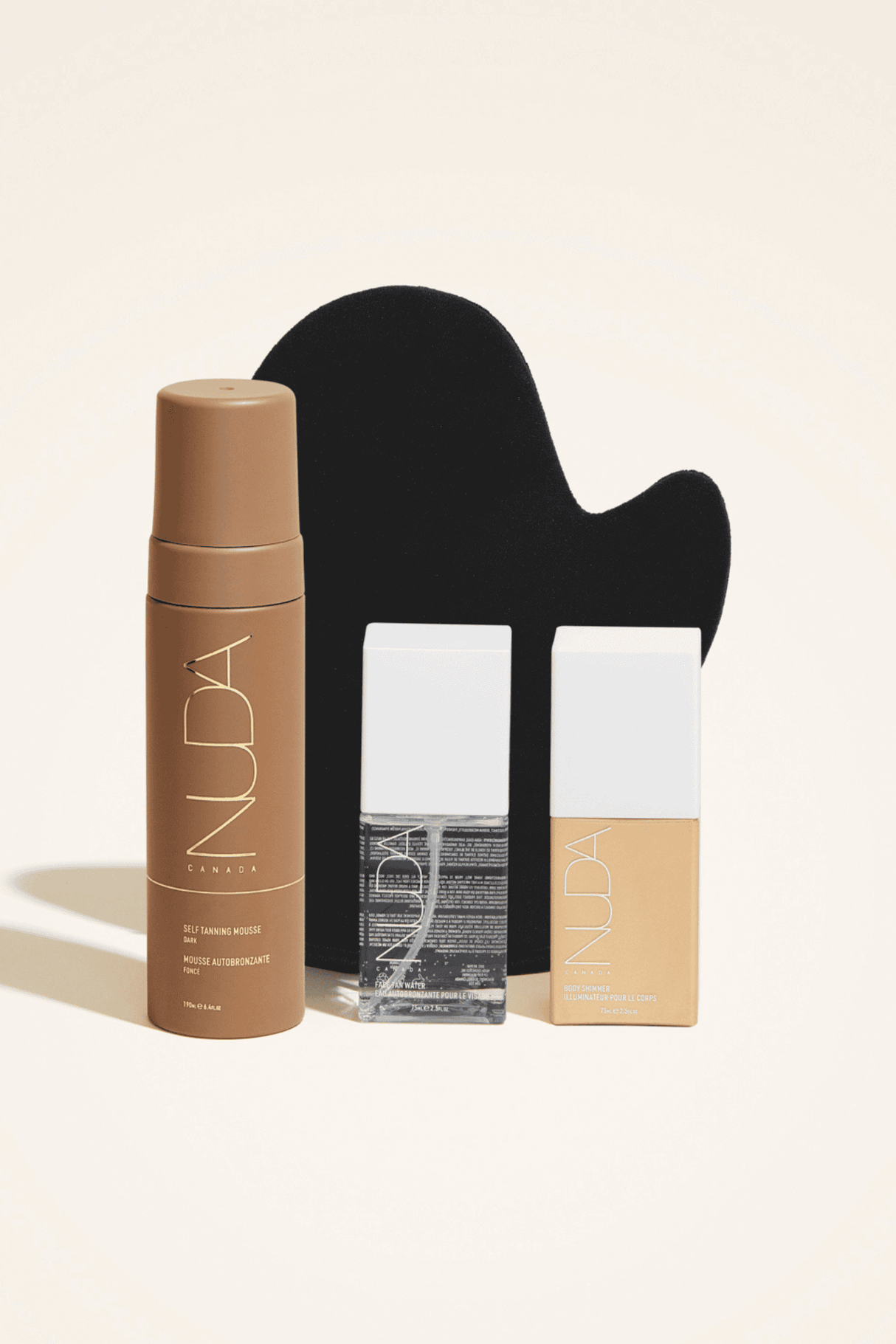 Ultimate Glow Kit featuring self tanning mousse, tanning mitt, facial self tanners, and body shimmer for a personalized bronzed look.