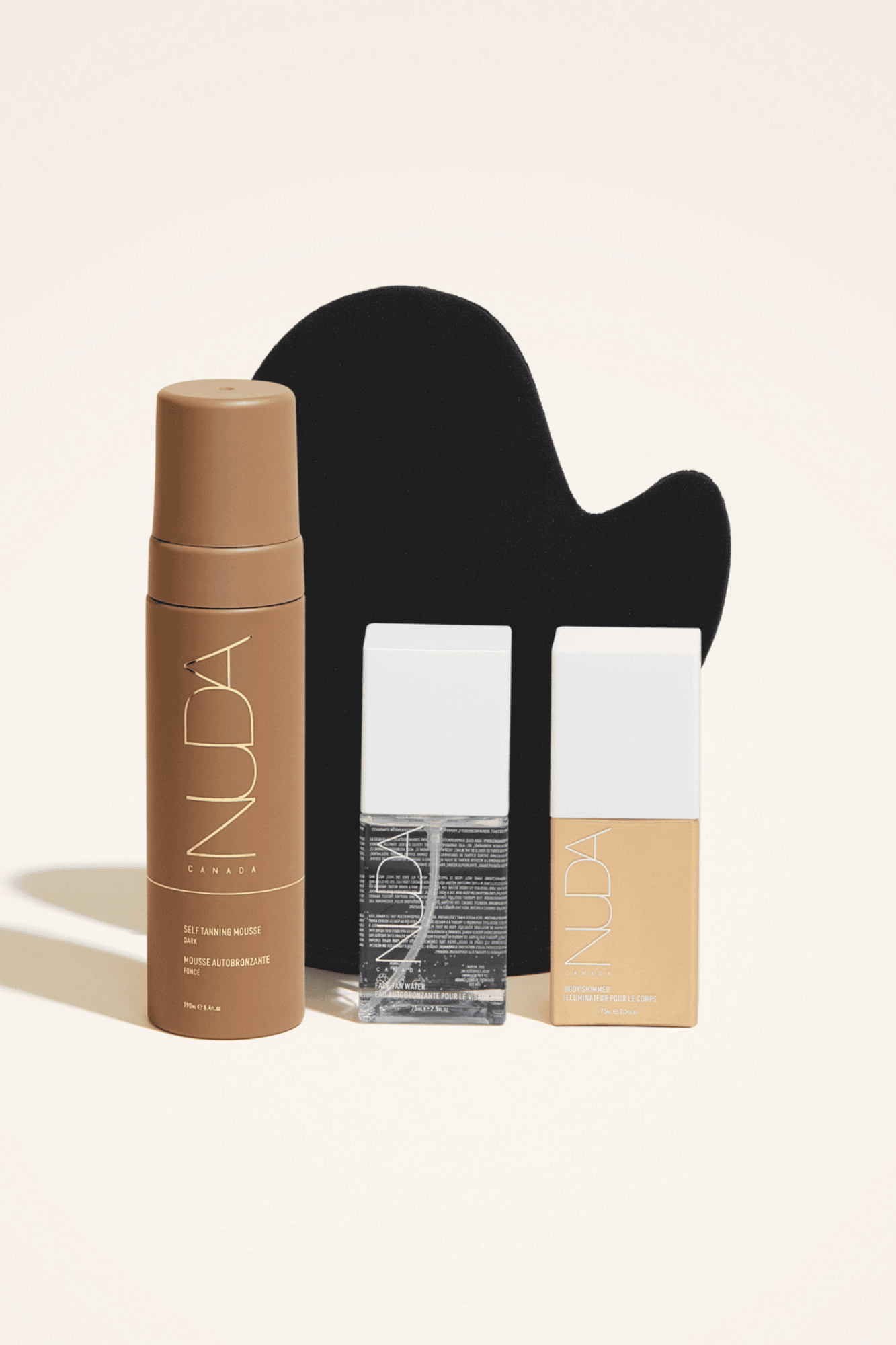 Ultimate Glow Kit featuring self tanning mousse, tanning mitt, facial self tanners, and body shimmer for a personalized bronzed look.