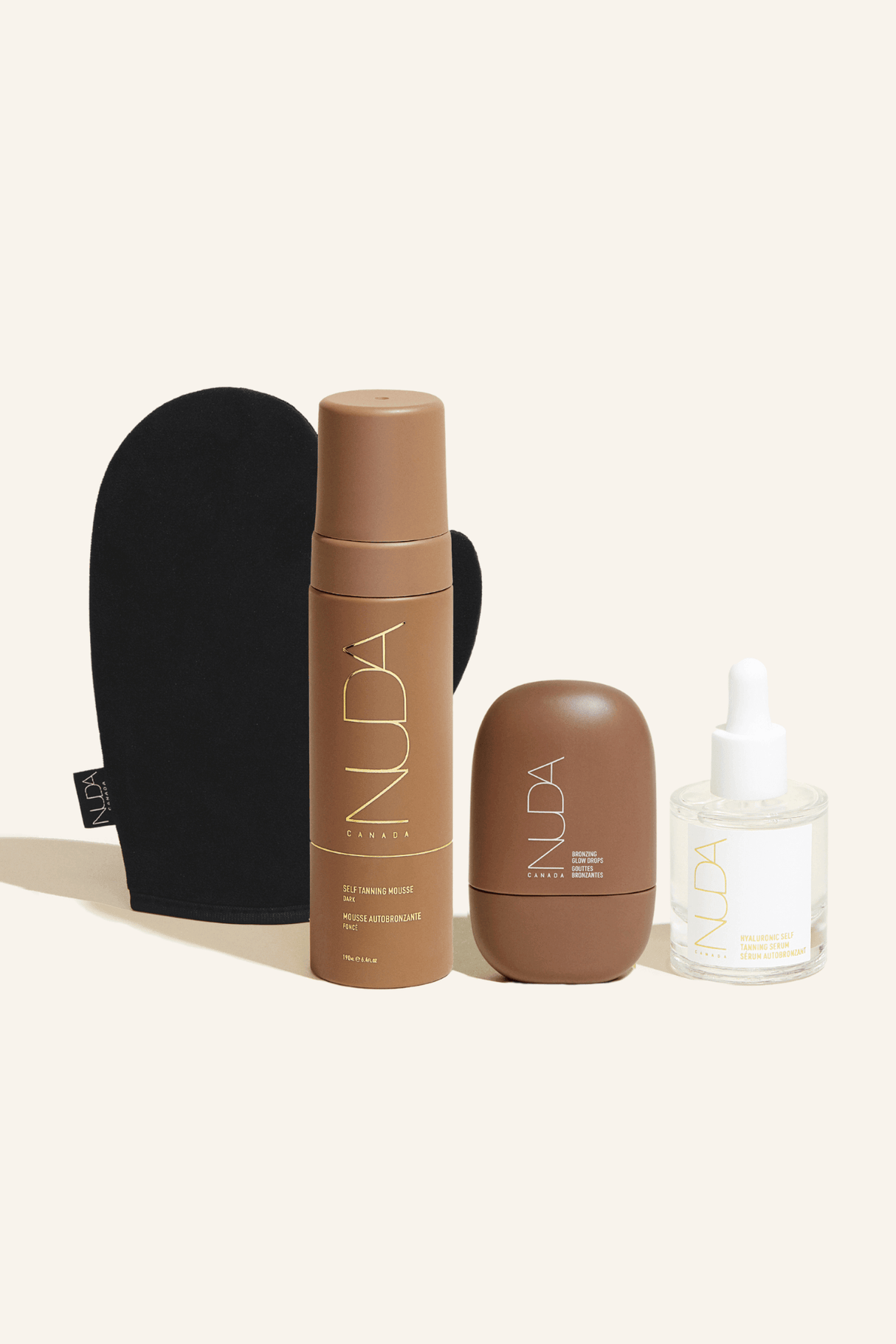 Ultimate Glow Kit with Self Tanning Mousse, Tanning Mitt, facial tanner, and Bronzing Glow Drops for a radiant complexion.
