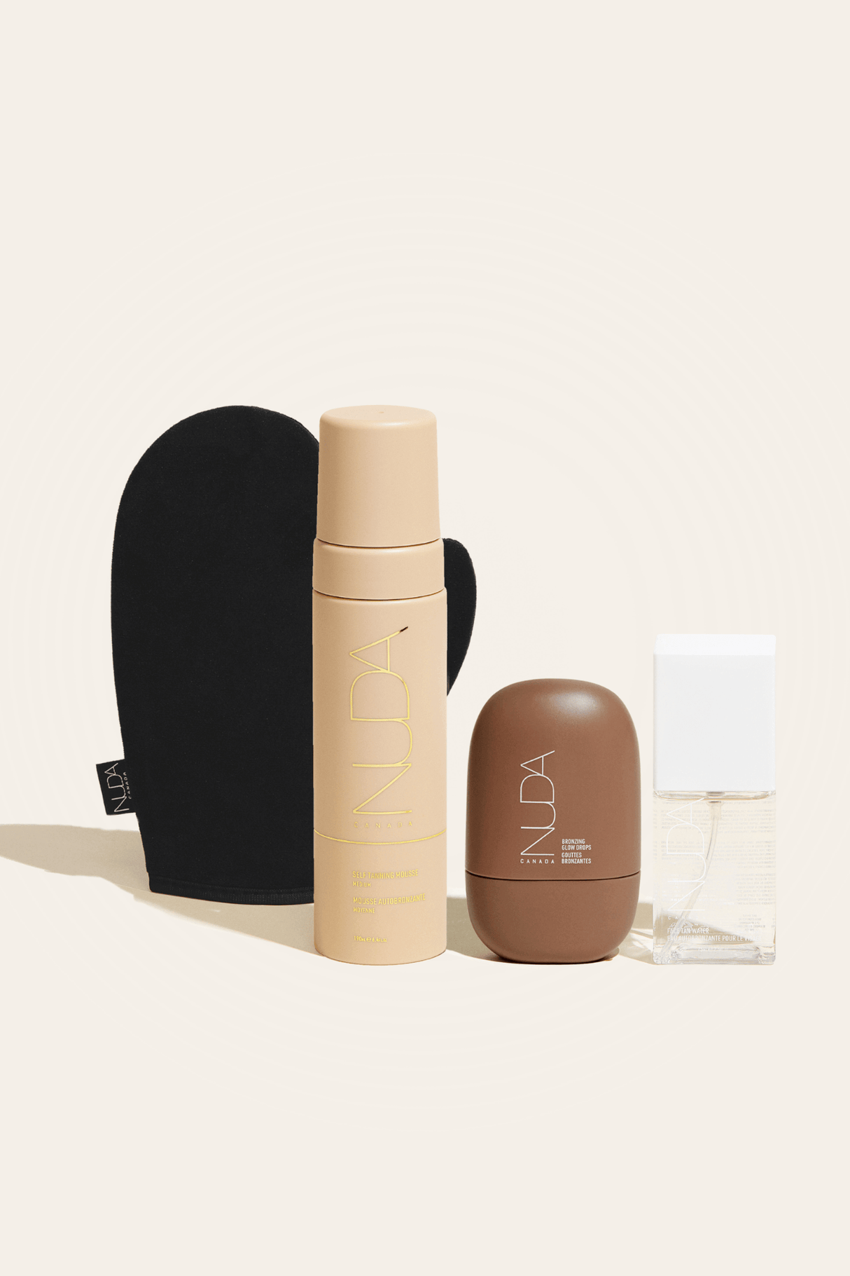 Ultimate Glow Kit with self tanning mousse, tanning mitt, and facial tanners for a radiant and bronzed complexion.