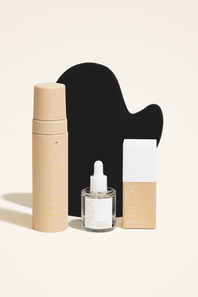 Ultimate Glow Kit featuring self tanning mousse, mitt, facial tanner, and bronzing glow drops for a radiant complexion.