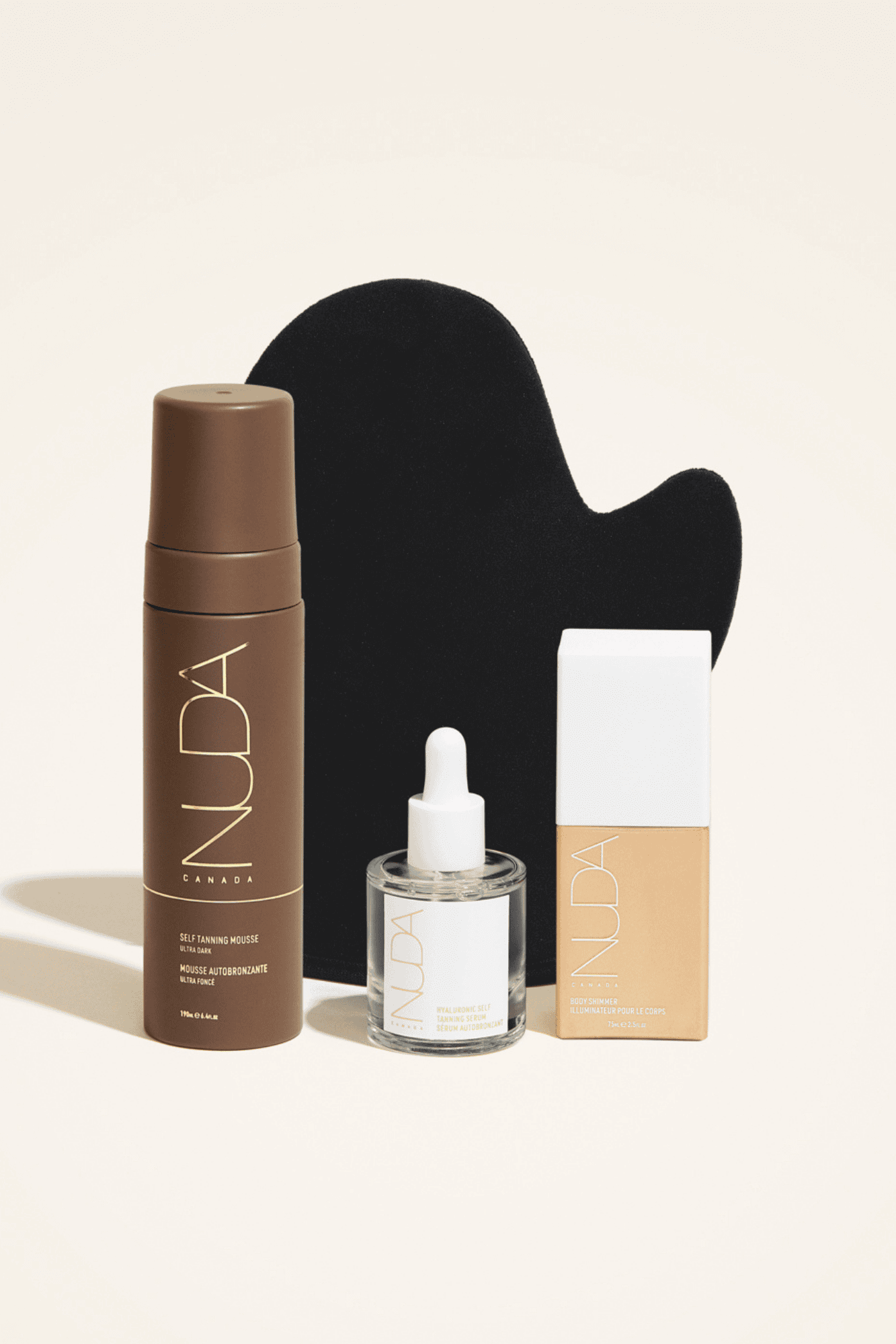 Ultimate Glow Kit featuring self tanning mousse, tanning mitt, and glow drops for customizable self-tanning and radiant complexion.