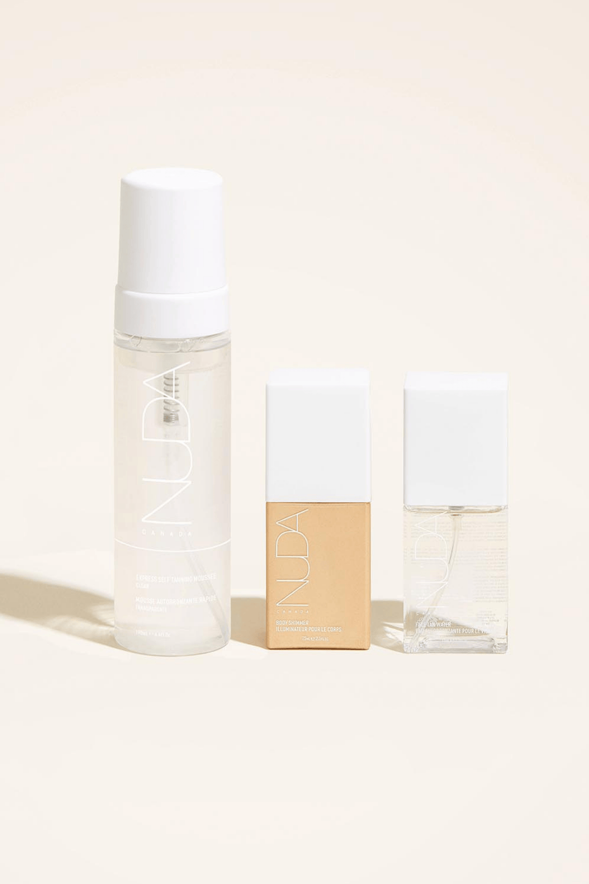 Ultimate Glow Trio featuring self tanning mousse, facial tanner, and bronzing glow drops for a customizable radiant glow.