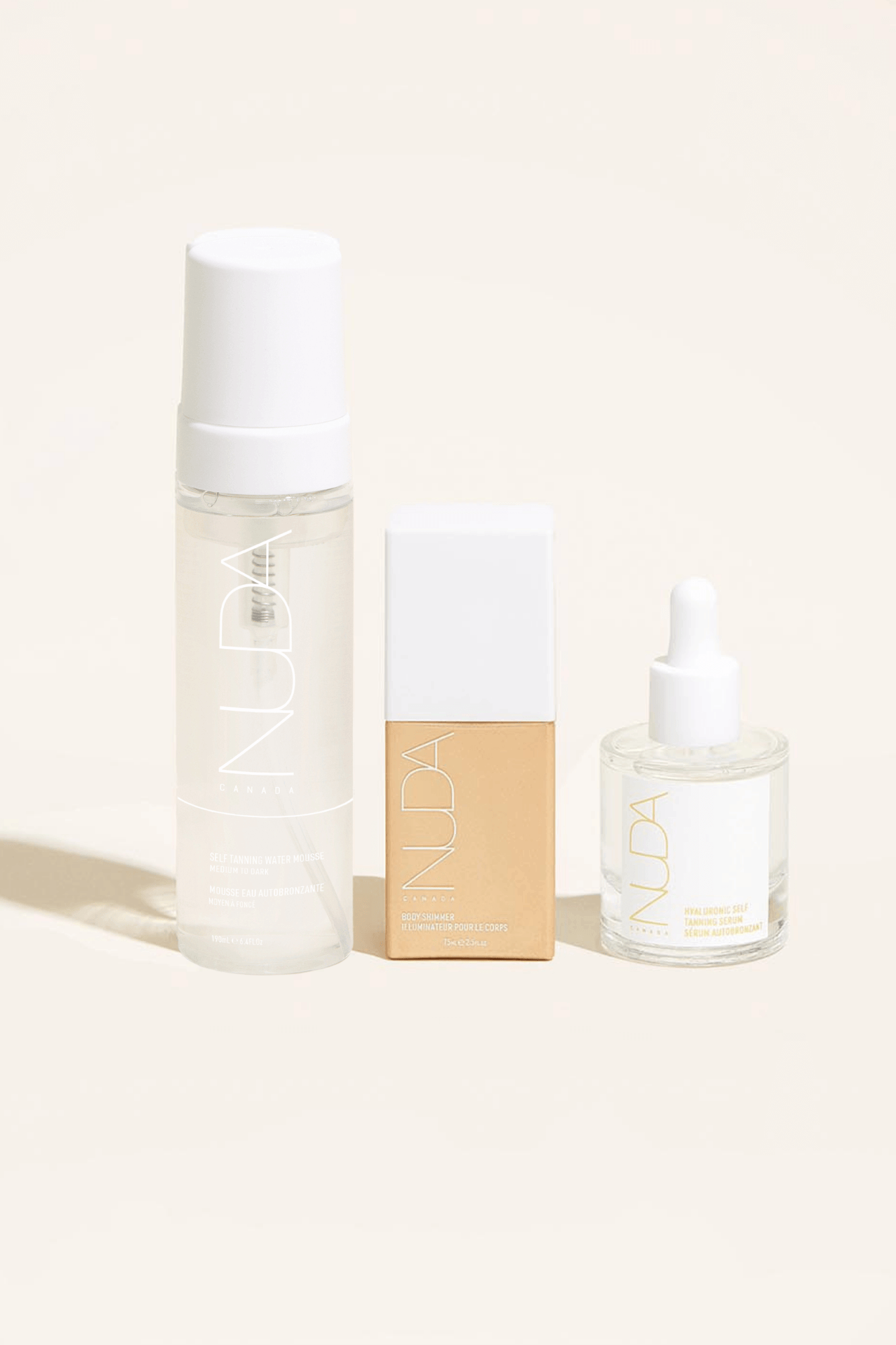 Ultimate Glow Trio featuring self tanning mousse, facial tanner, and glow drops for radiant skin and customized self-tan.