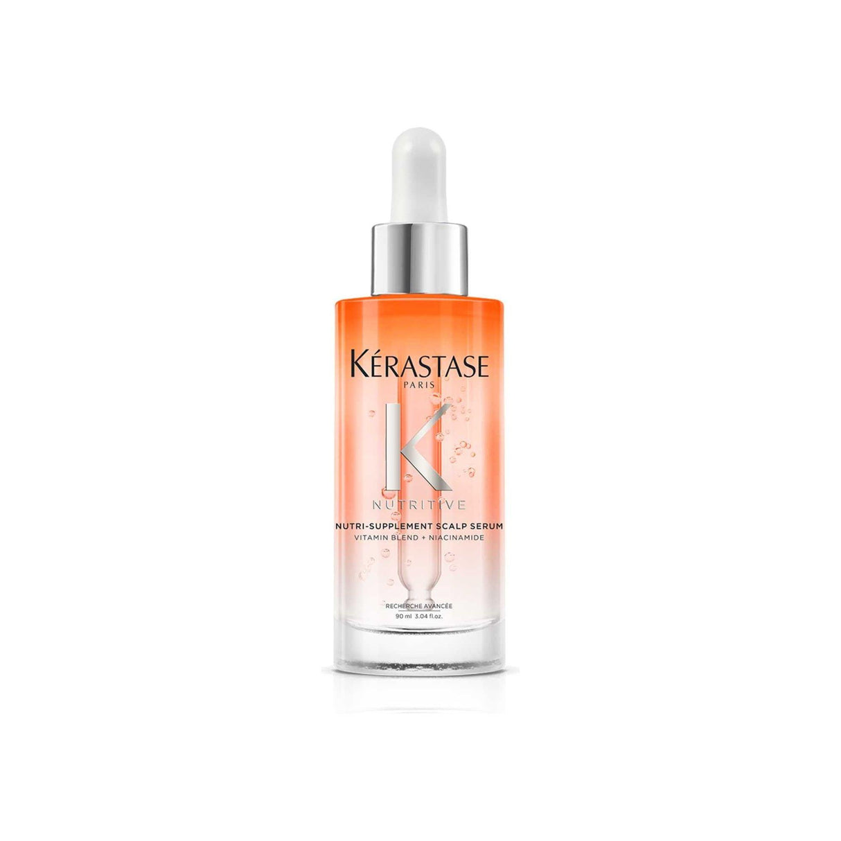 Kérastase Nutri-Supplement Scalp Serum bottle with a dropper, designed for dry scalps, features niacinamide for nourishment and hydration.