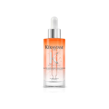 Kérastase Nutri-Supplement Scalp Serum bottle with a dropper, designed for dry scalps, features niacinamide for nourishment and hydration.