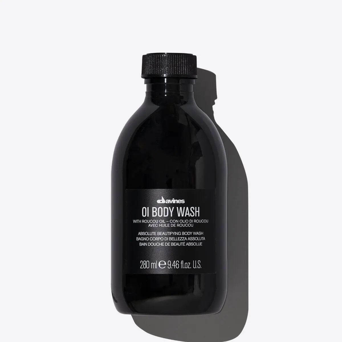 Davines Oi Body Wash bottle with moisturizing shower gel for gentle cleansing and hydration on a white background.