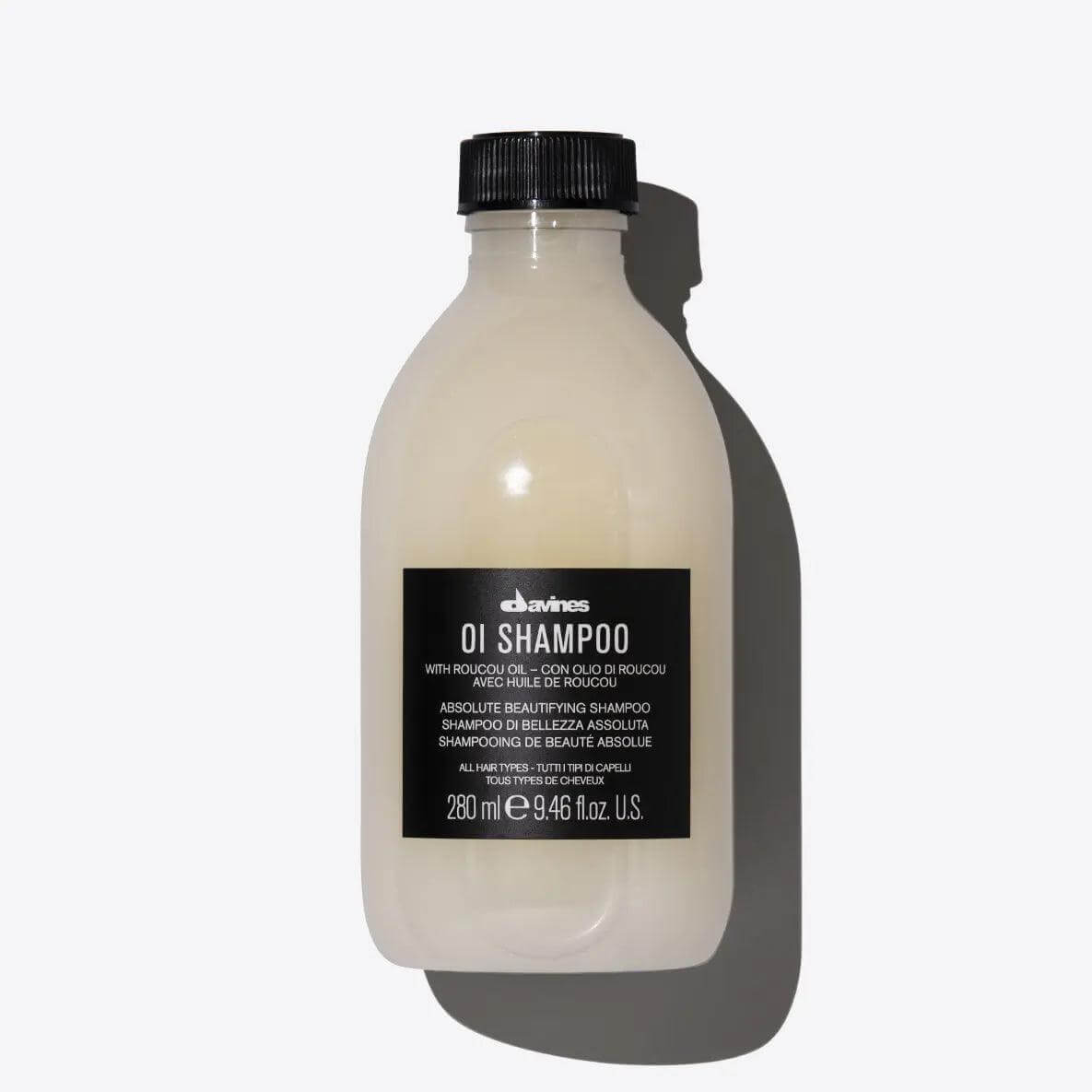 Davines Oi Shampoo bottle with roucou oil for soft hair, 280 ml size.