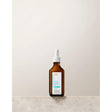 Moroccanoil Oil-No-More Scalp Treatment bottle for oily hair care, featuring ginger oil and purifying agents.