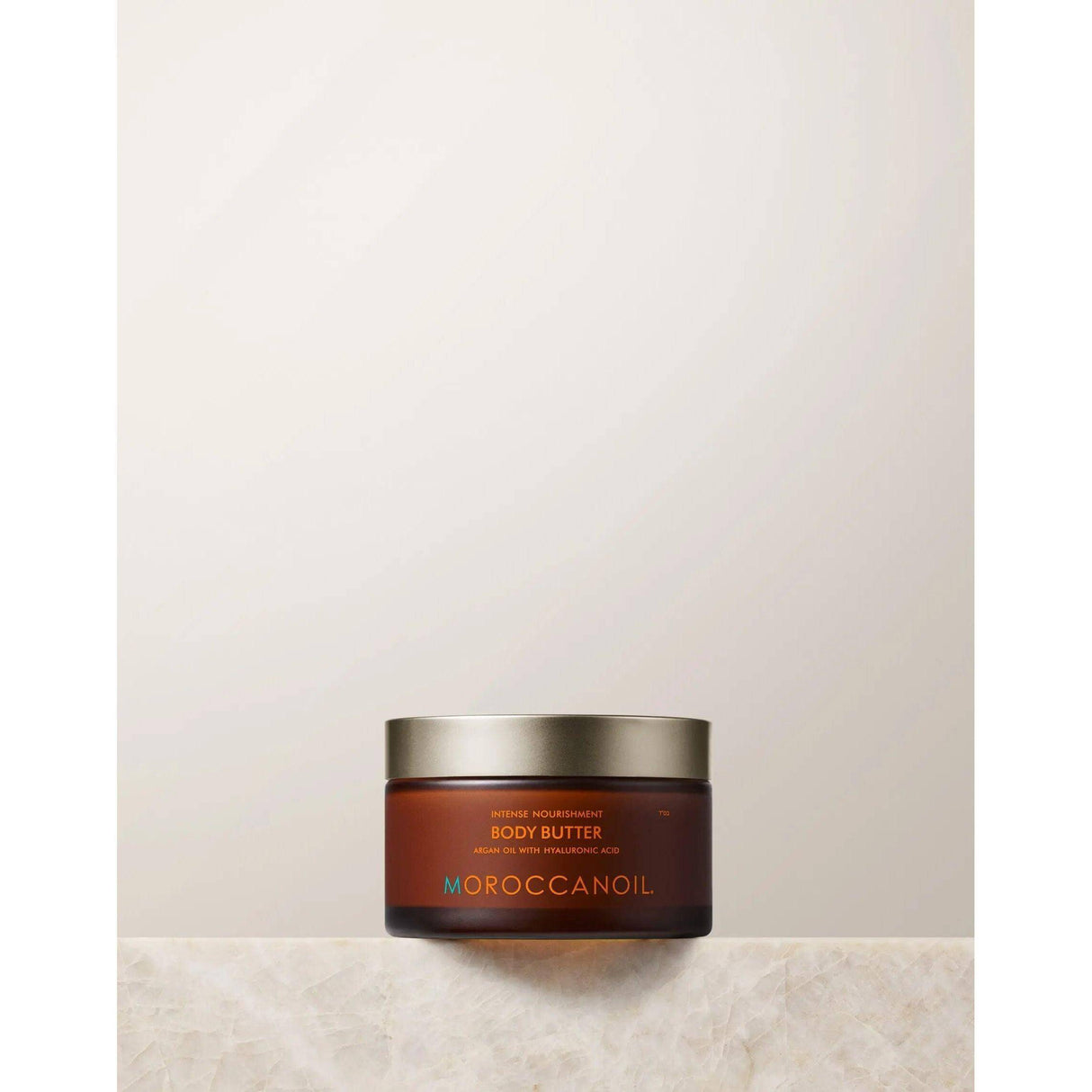 Jar of Original Body Butter Lotion for deep hydration with argan oil, shea, cocoa, and mango butters on a neutral background.