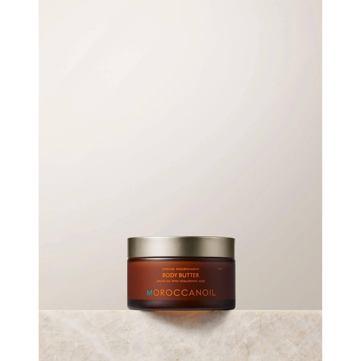 Jar of Original Body Butter Lotion for deep hydration with argan oil, shea, cocoa, and mango butters on a neutral background.