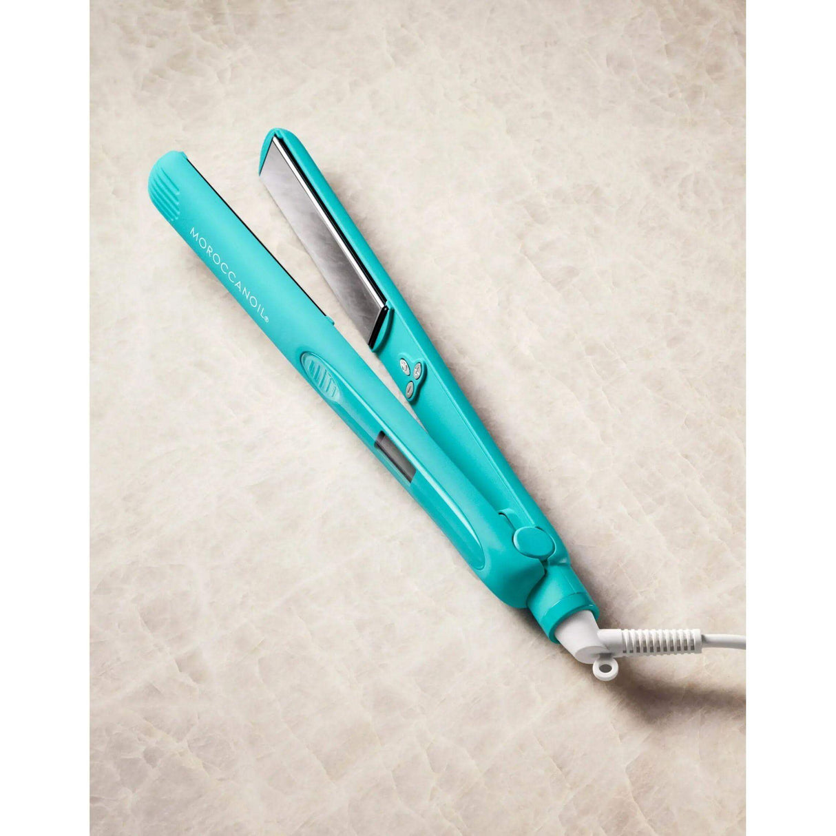 Perfectly Polished Titanium Flat Iron for sleek, frizz-free styles with advanced heating, extra-long plates, and seamless glide.
