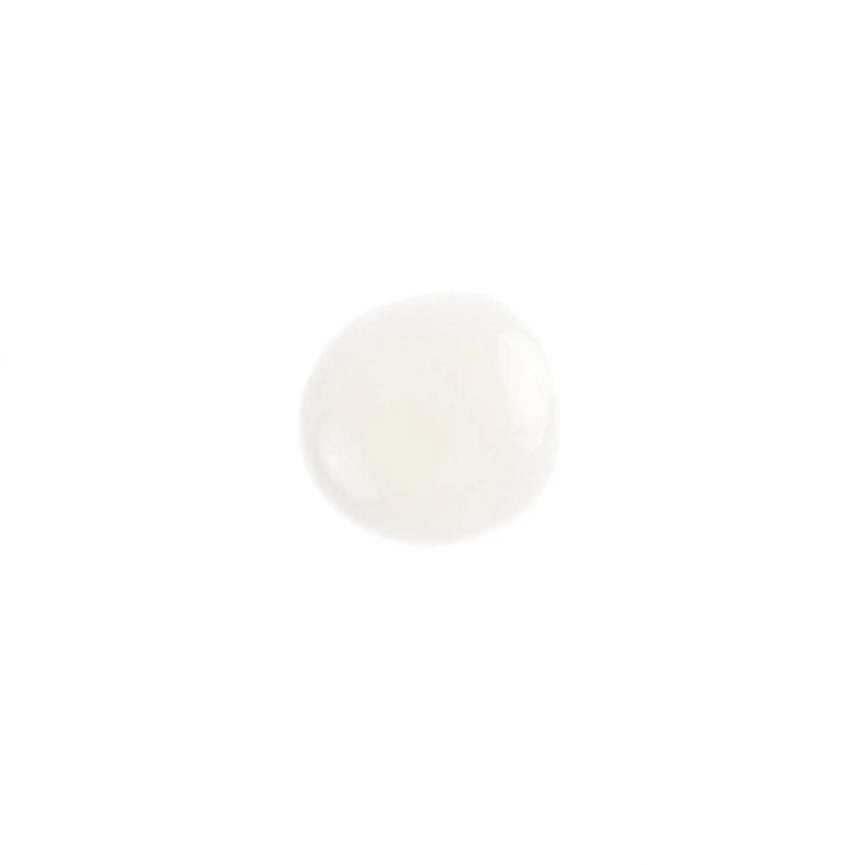 Close-up view of Phytowhite Dark Spot Serum texture, showcasing its creamy and smooth consistency for even skin tone treatment.