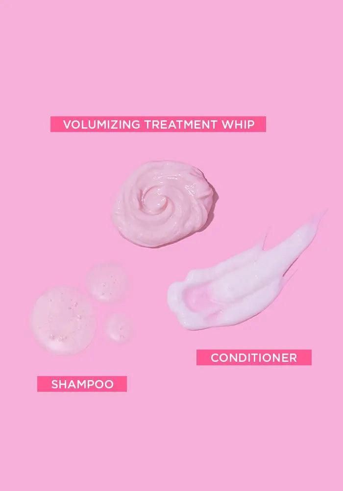 PUFF.ME Volume Glitz Kit products: shampoo, conditioner, and volumizing treatment whip on a pink background.