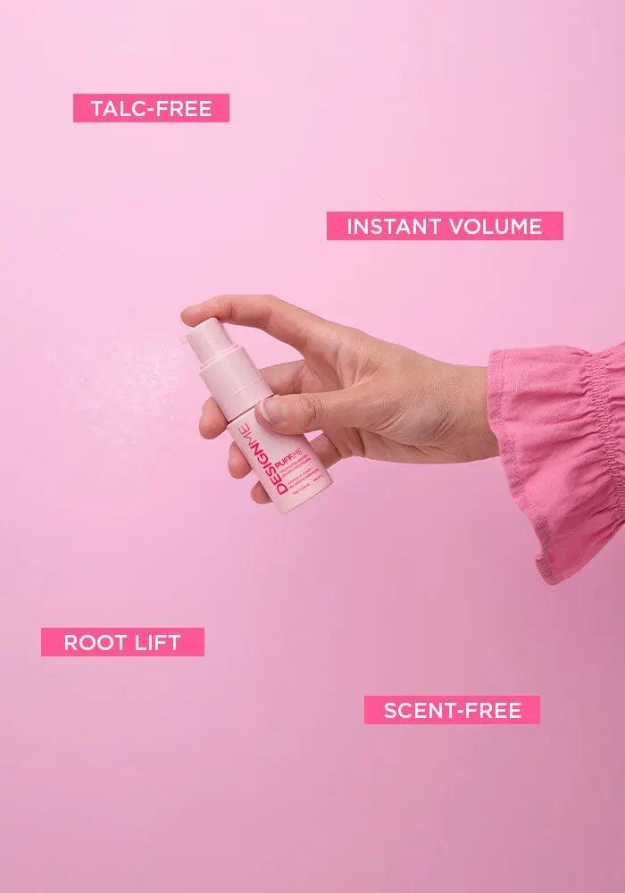 Hand holding PUFF.ME product for instant volume and root lift, talc-free and scent-free formula against a pink background.
