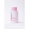 Puff.Me Volumizing Conditioner for lift and detangle, featuring pink lid and white bottle, 300 ml.
