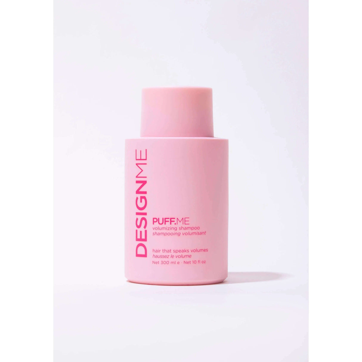 Design.ME Puff.Me Volumizing Shampoo in pink bottle for weightless volume and vibrant hair.