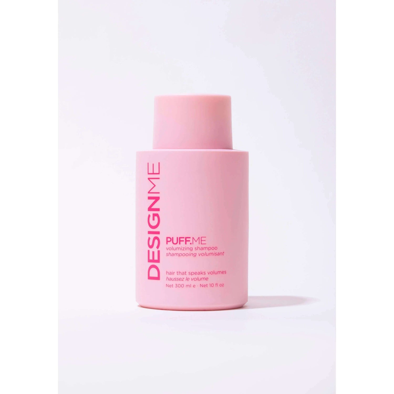 Design.ME Puff.Me Volumizing Shampoo in pink bottle for weightless volume and vibrant hair.