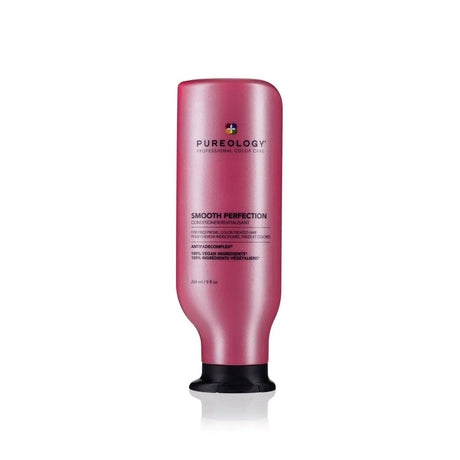 Pureology Smooth Perfection Conditioner for color-treated hair in a pink bottle.