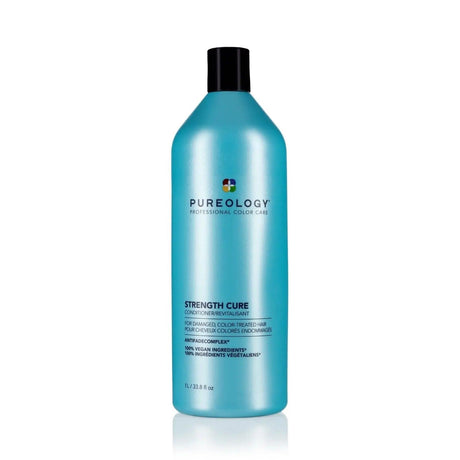 Pureology Strength Cure Conditioner bottle for damaged hair repair and restoration with Asta-Repair and antioxidants.