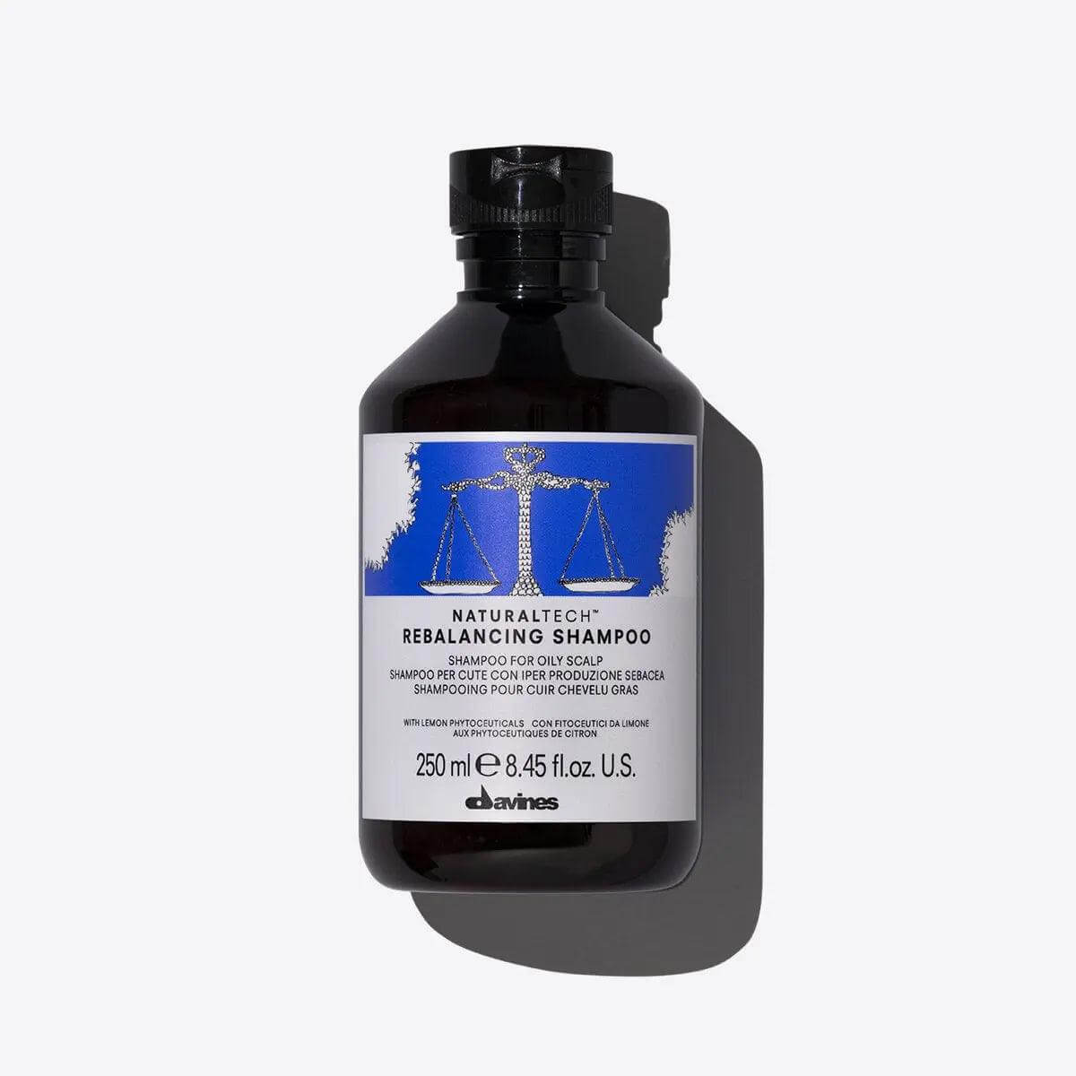 Bottle of Naturaltech Rebalancing Shampoo for oily scalps, 250ml. Normalizes excess sebum, maintaining scalp balance.