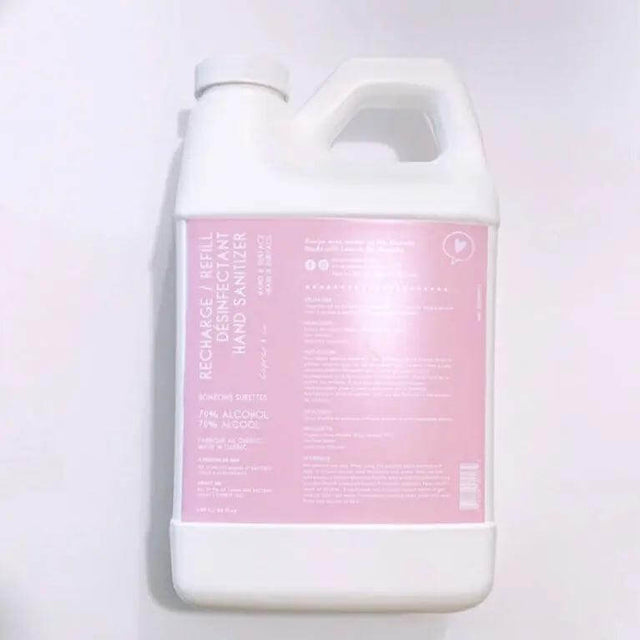 Large bottle of sour candy-scented hand sanitizer spray, 66.5 fl oz, Health Canada approved for eliminating germs on hands and surfaces.