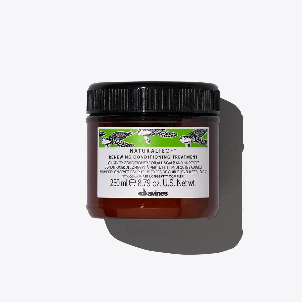 Renewing Conditioning Treatment jar, 250ml, for nourishing and hydrating scalp and hair, promoting longevity and shine without added weight.