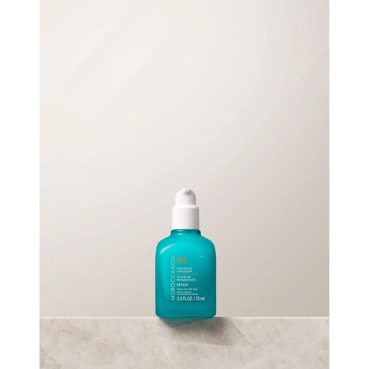Moroccanoil Repair Mending Infusion bottle for nourishing split ends, controls frizz, suitable for all hair types and textures.