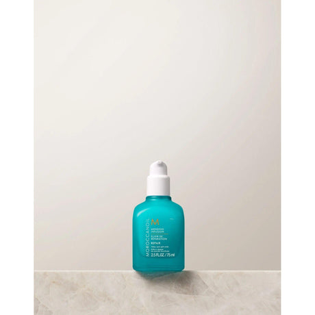 Moroccanoil Repair Mending Infusion bottle for nourishing split ends, controls frizz, suitable for all hair types and textures.