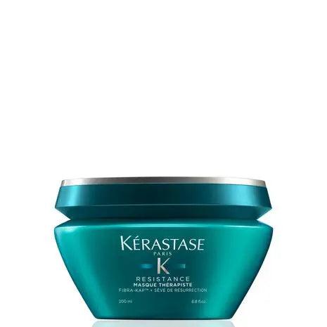 Kerastase Resistance Masque Therapiste restorative hair mask for damaged hair in a teal container.