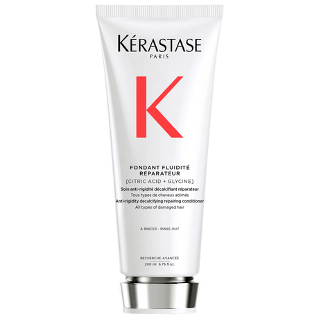 Kérastase Fondant Fluidité Réparateur Conditioner tube for damaged hair, restores elasticity and moisture.