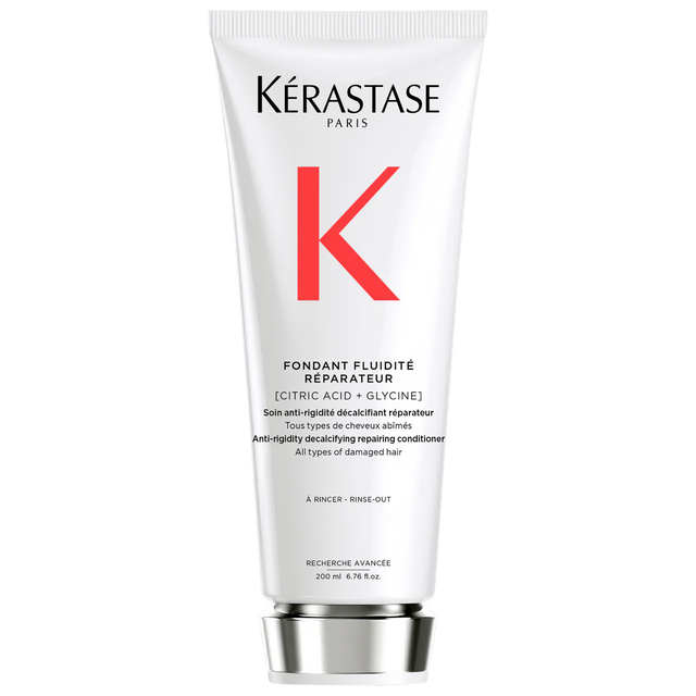 Kérastase Fondant Fluidité Réparateur Conditioner tube for damaged hair, restores elasticity and moisture.