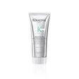 Kérastase Scalp Purifying Micro-Peeling Scrub bottle for exfoliating and revitalizing the scalp, suitable for all hair types and textures.