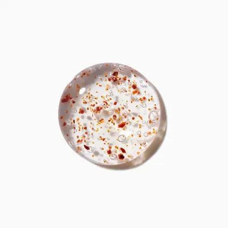 Scalp Purifying Micro-Peeling Scrub texture with exfoliating micro beads for revitalizing and cleansing. Ideal for sensitive scalps.