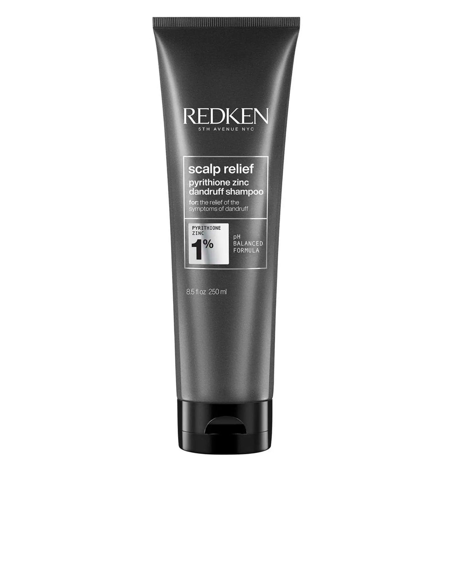 Redken Scalp Relief Dandruff Shampoo bottle for all hair types and textures, targeting dandruff and flaky scalp issues.
