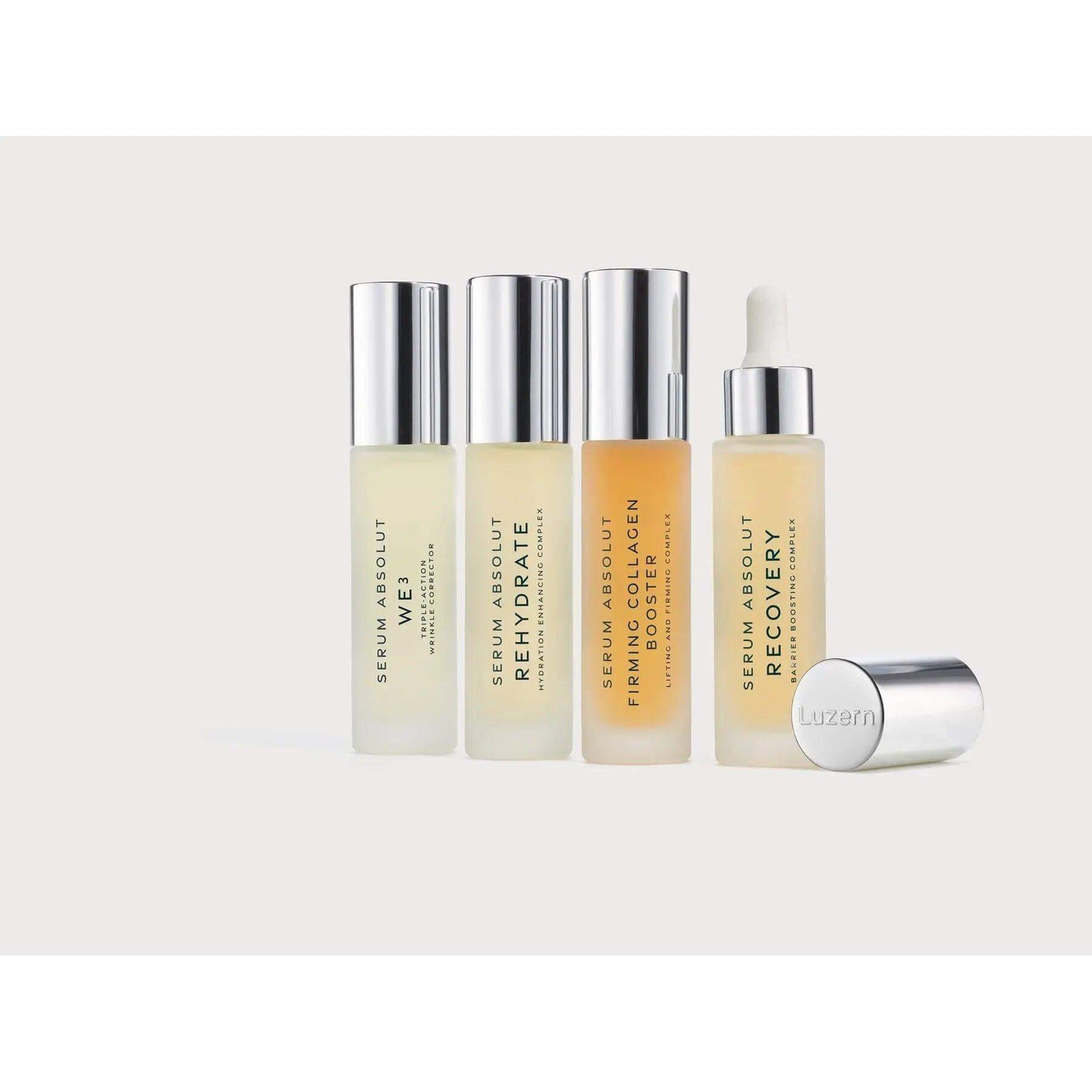 "Serum Absolut Recovery and skincare collection bottles featuring recovery, hydration, and collagen boost benefits."