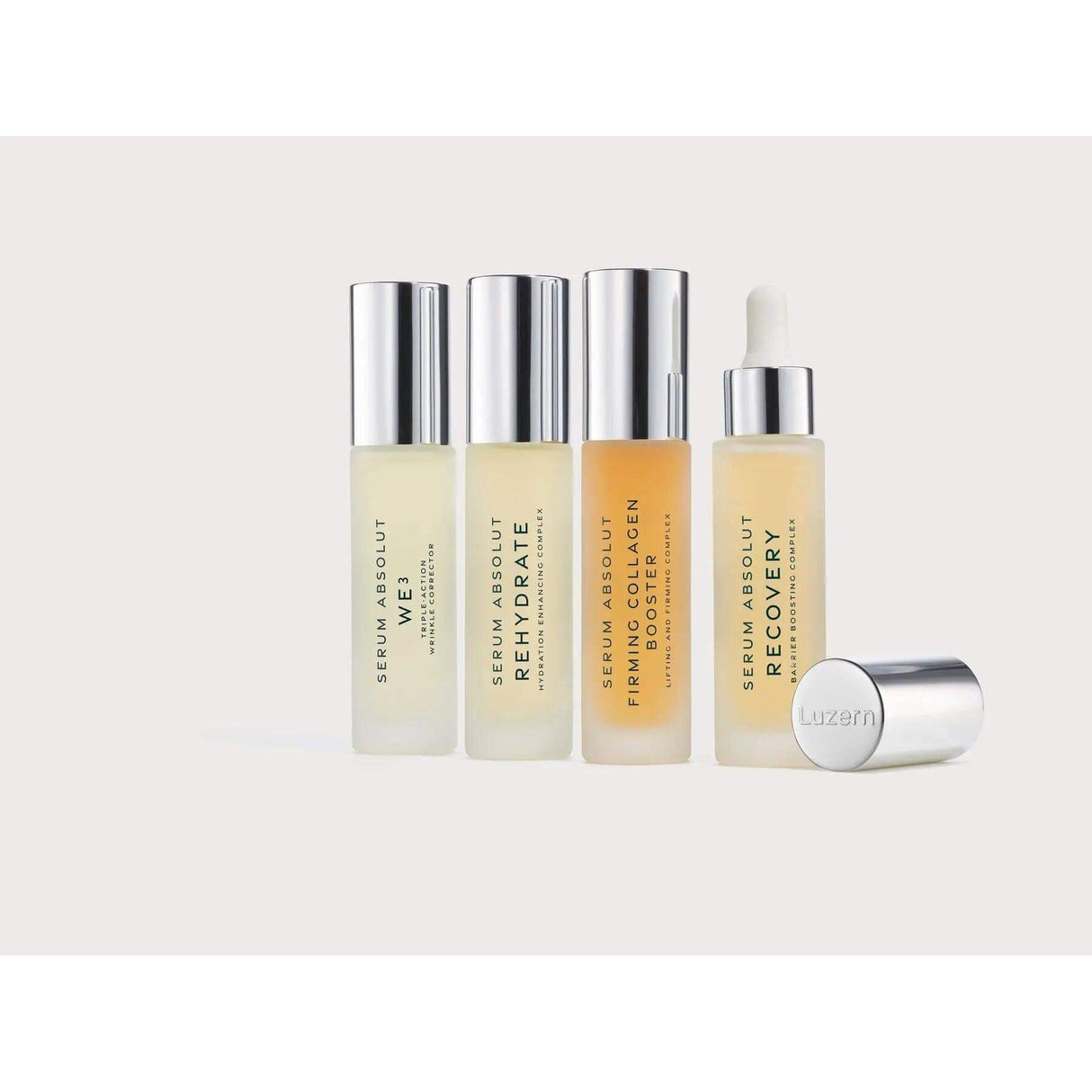 Collection of Serum Absolut products including Rehydrate, designed to fortify skin's lipid barrier and lock in moisture.