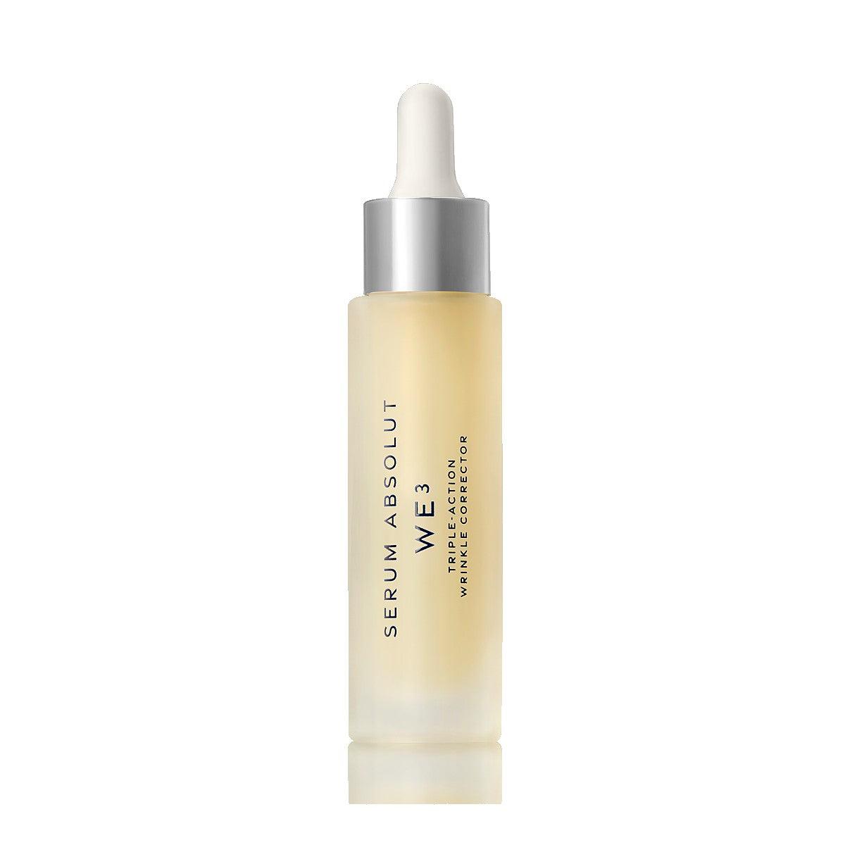 Serum Absolut WE3 anti-aging serum bottle with dropper, reduces fine lines and promotes smooth, youthful skin.