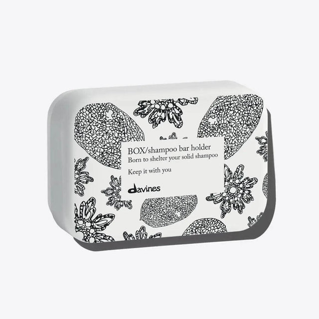 Aluminum shampoo bar case with floral design, durable and practical for storage, ensuring shampoo bars last longer.