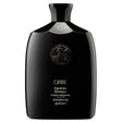 Oribe Signature Shampoo in sleek black bottle for men's hair care.