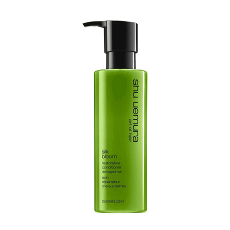 Shu Uemura Silk Bloom Conditioner 250ml bottle, restorative care for dry, brittle, and chemically-treated hair.
