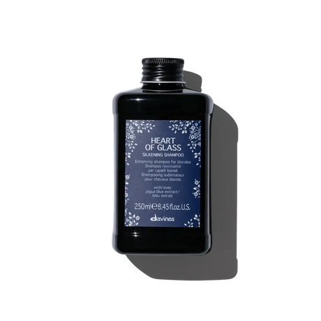 Bottle of Heart of Glass Silkening Shampoo for enhancing blonde hair with nourishing and clarifying formula, 250ml.