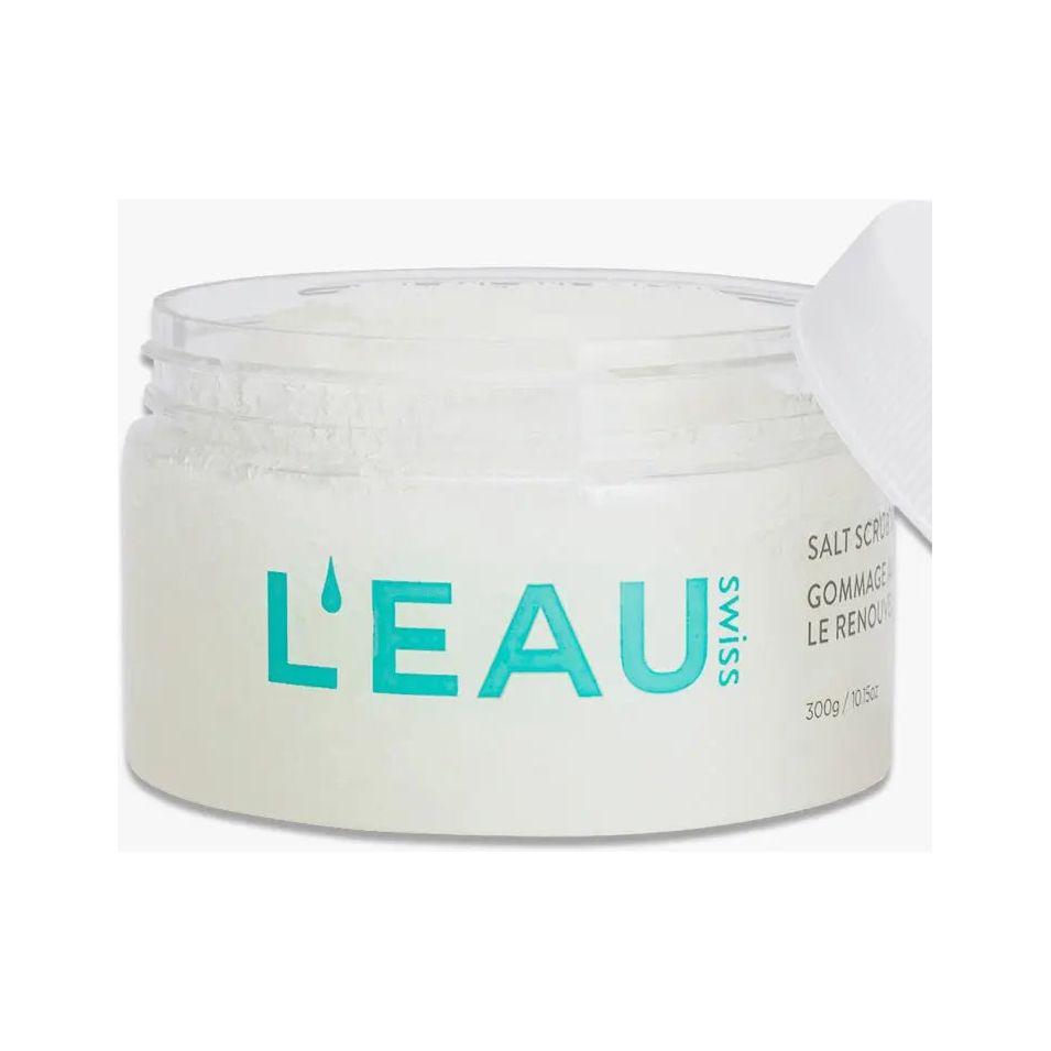 L'EAU Swiss Skin Renewal Salt Scrub in clear container, designed to exfoliate and rejuvenate skin for a silky, revitalized feel.