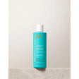 Moroccanoil Smoothing Shampoo with argan oil bottle for frizzy hair control and hydration